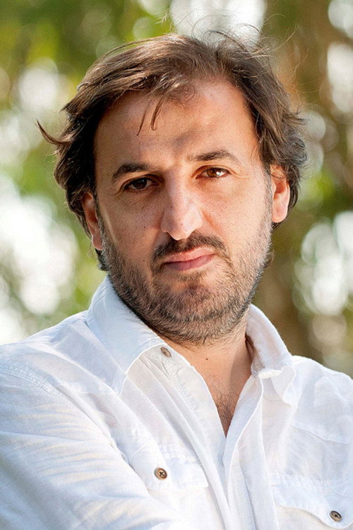 Özcan Alper profil fotoğrafı